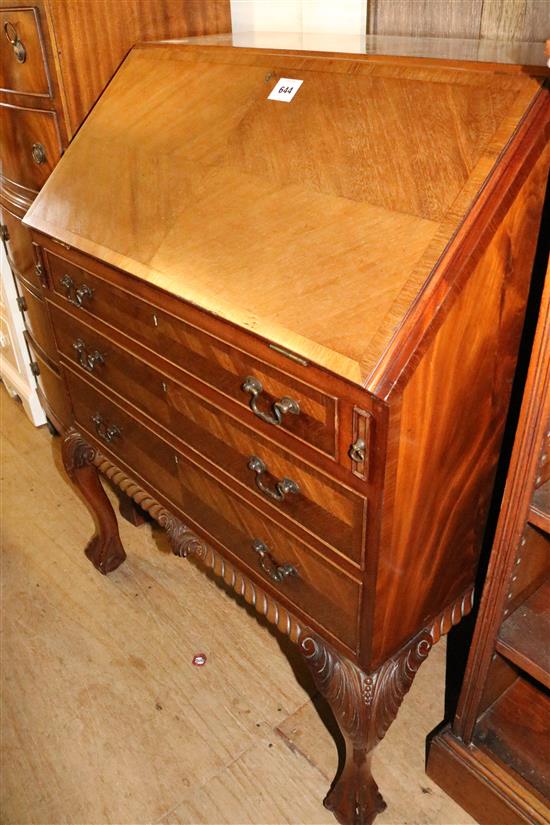 Mahogany bureau on ball and claw feet(-)